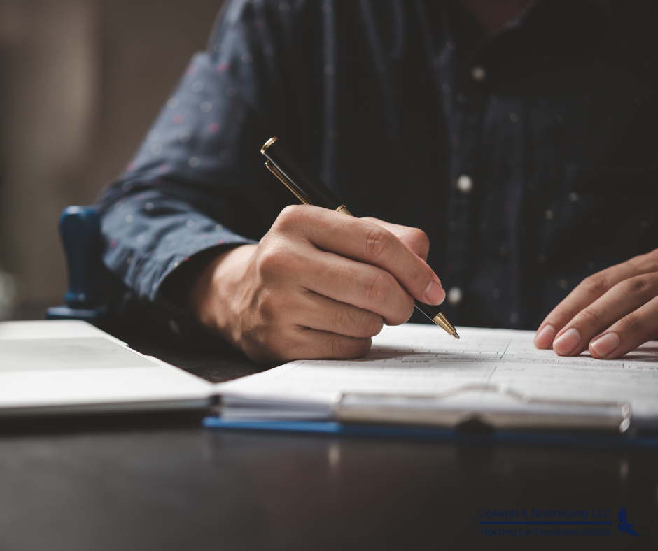 Person signing paperwork