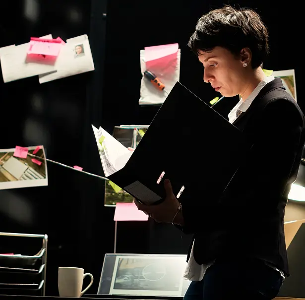 lady reading binder
